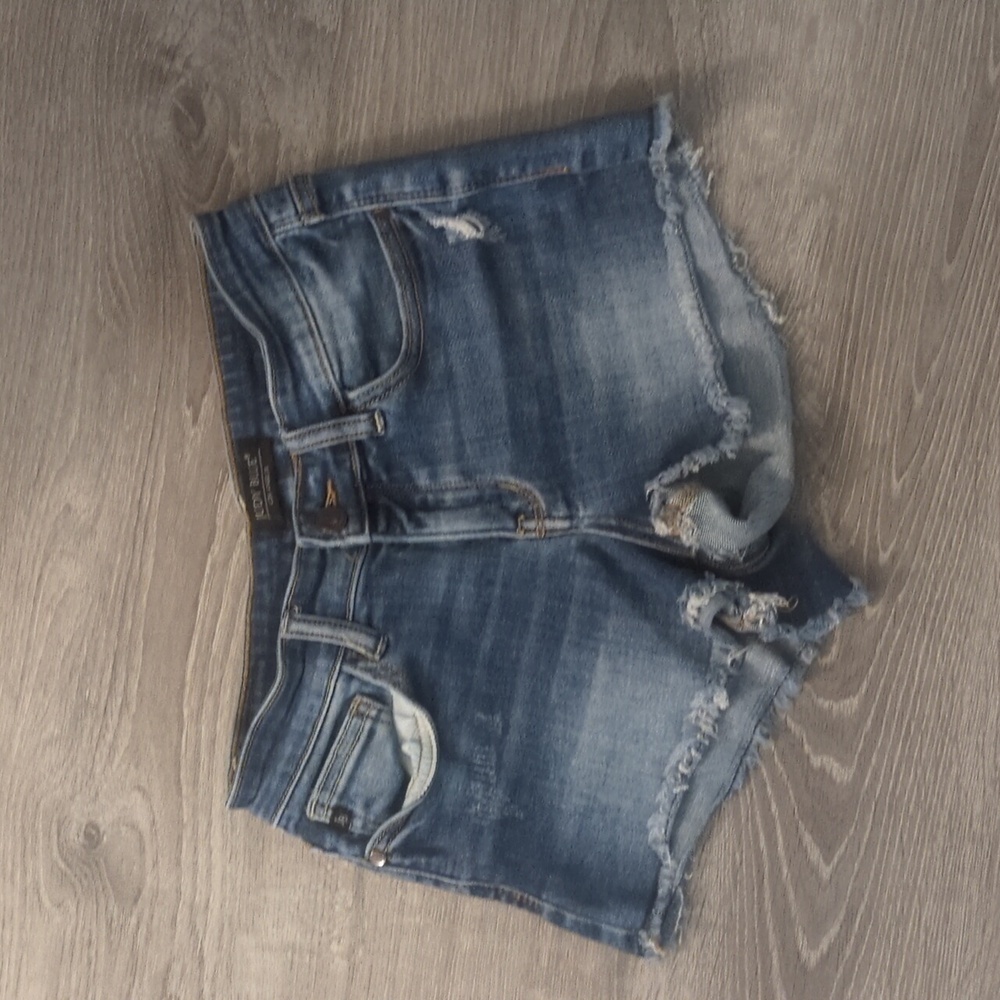 Judy blue distressed fringed jean shorts size Small